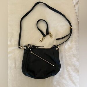 Michael Kors black leather handbag with cross body strap and shoulder strap